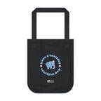 Black canvas tote bag with printed design featuring a blue elephant and 'have a tootiful tootiful day’ text with pink floral design on a a white background.
