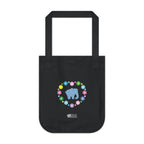 Black canvas tote bag featuring a colorful printed design; a blue elephant with floral heart shaped design on a white background.  