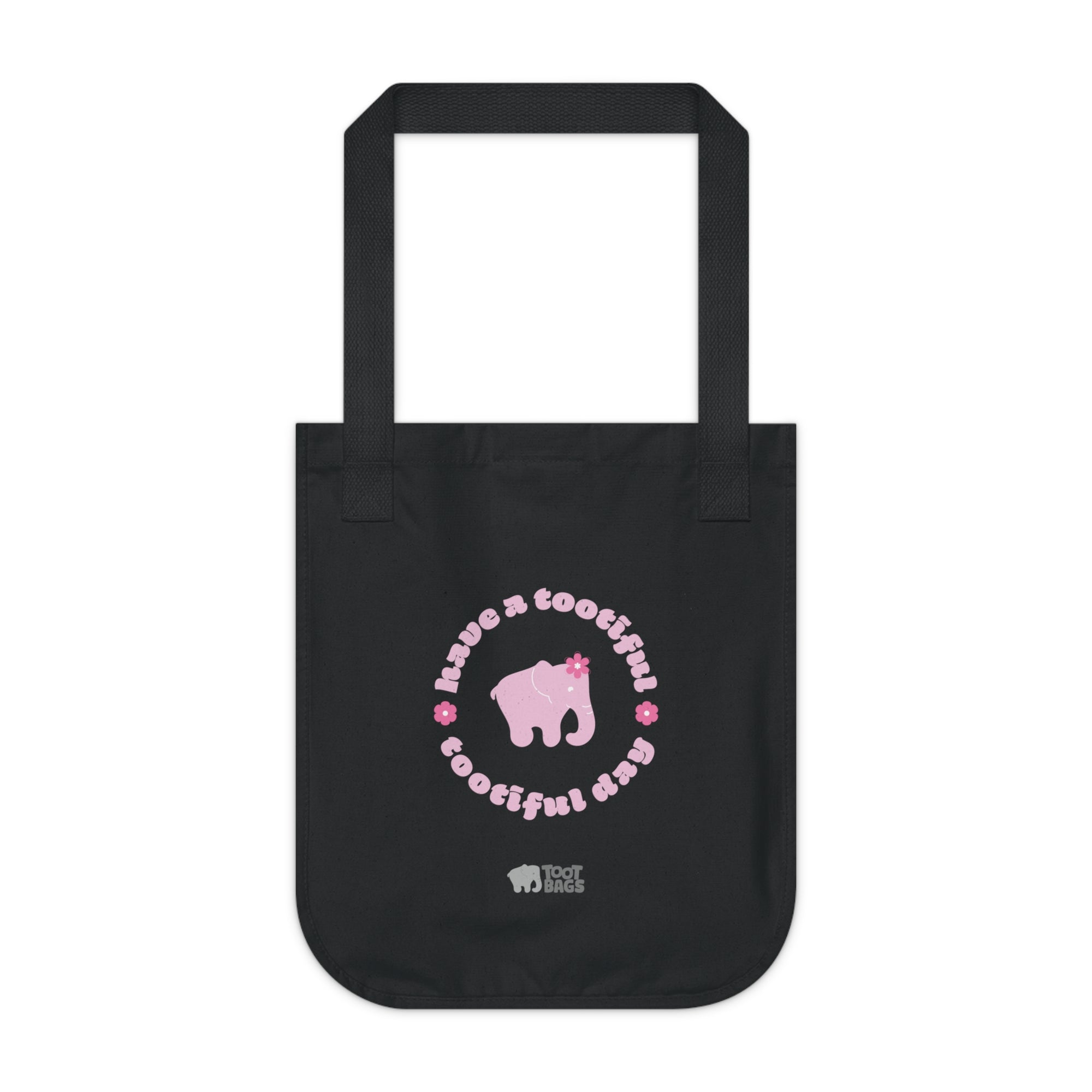 Black canvas tote bag with a pink elephant and text with pink flowers on a white background.