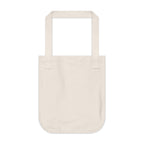 Natural beige canvas tote bag, blank backside on a white background.