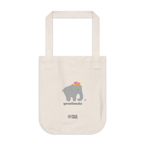 Natural beige canvas tote bag featuring printed design; a gray elephant, gray 'gratitude' text and colorful hearts on a white background.  