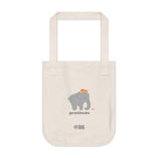Natural beige canvas tote bag with printed design featuring a gray elephant, gray 'gratitude’ text with colorful hearts on a white background.