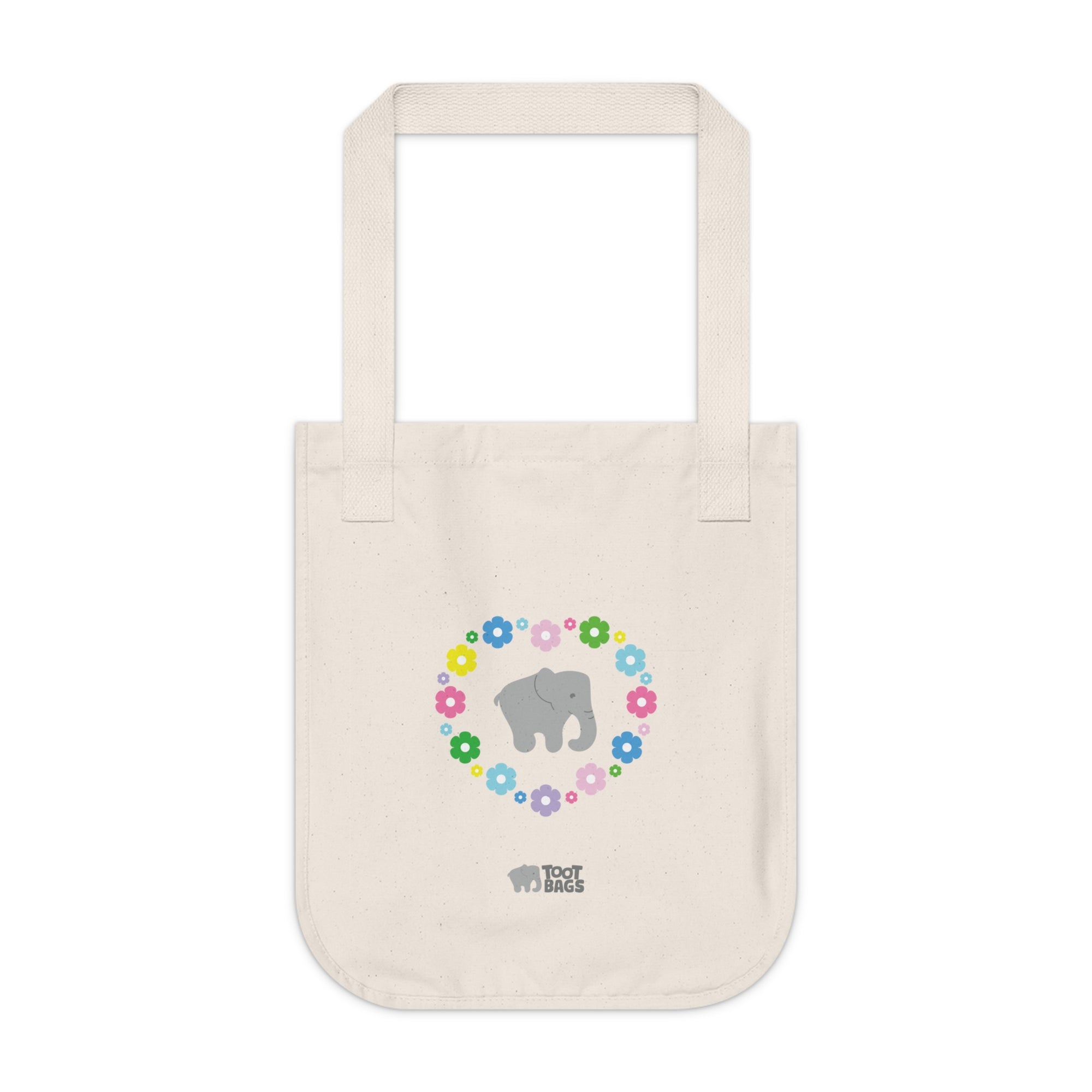 Natural beige canvas tote bag with a printed heart design featuring a gray elephant and colorful flowers on a white background.