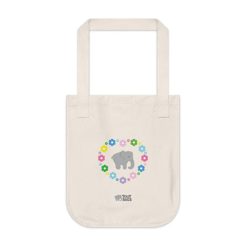 Natural beige canvas tote bag with a printed heart design featuring a gray elephant and colorful flowers on a white background.