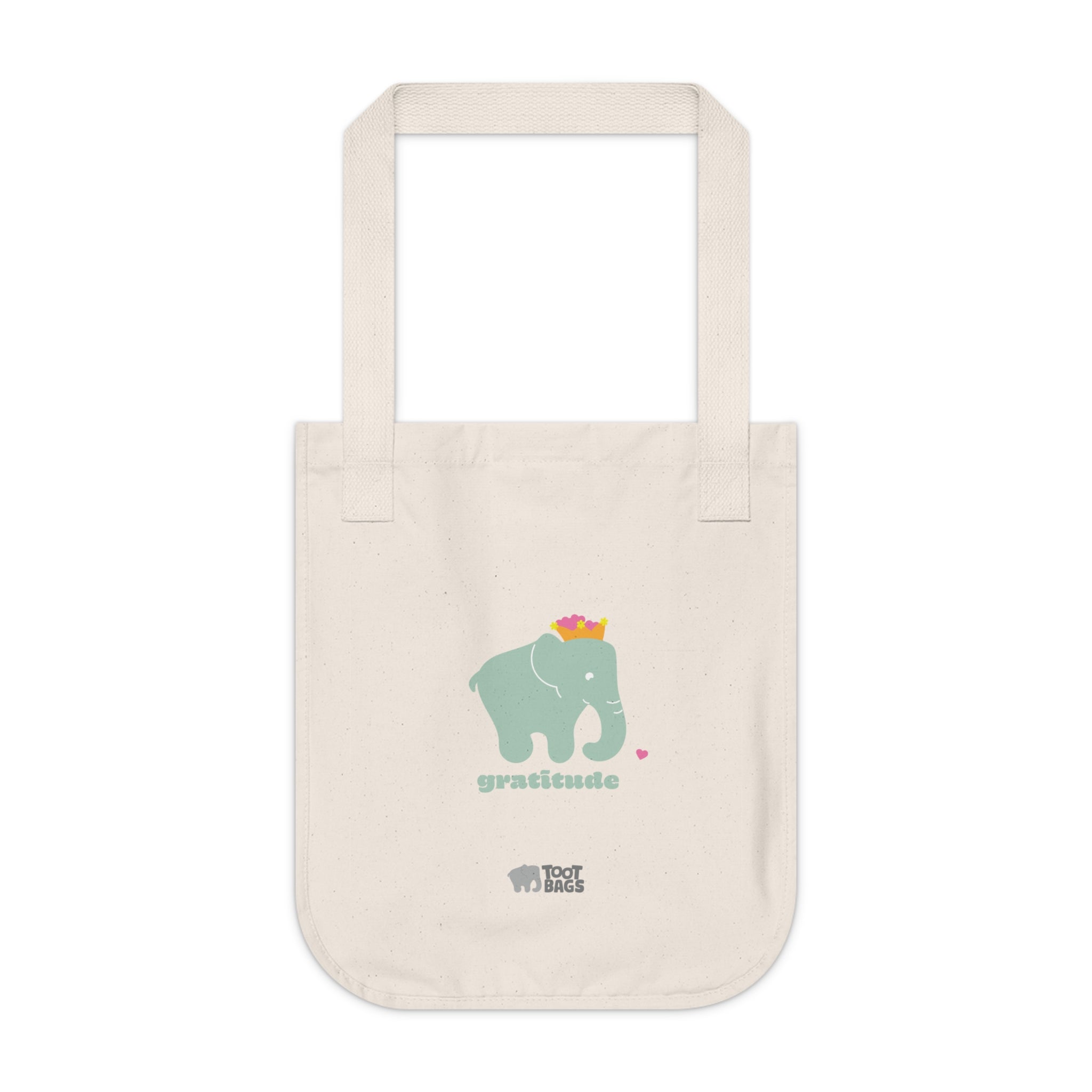 Natural beige canvas tote bag featuring printed design; a matcha color elephant and 'gratitude' text with colorful pink hearts on a white background.