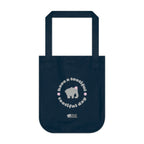 Navy blue canvas tote bag with printed design featuring a gray elephant, gray 'have a tootiful tootiful day’ text with pink floral design on a white background.