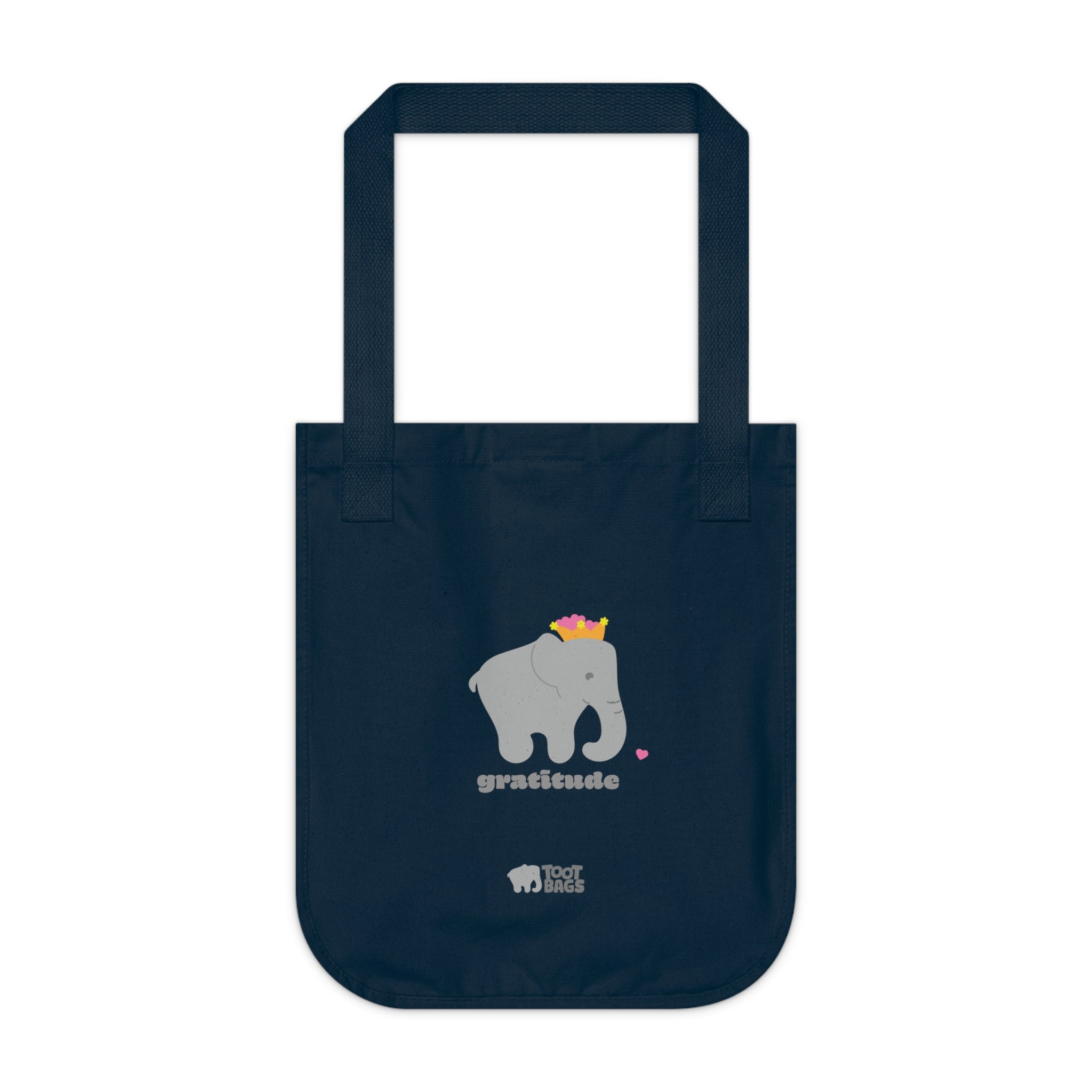 Navy blue canvas tote bag featuring a printed design; a gray elephant, gray 'gratitude' text and colorful hearts on a white background.